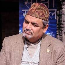 Dr. Amod Dixit, President